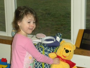 Surprised to put her pooh bear down for the trip and find the baskets on the couch!