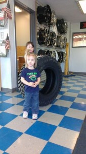 The tires are as big as her!